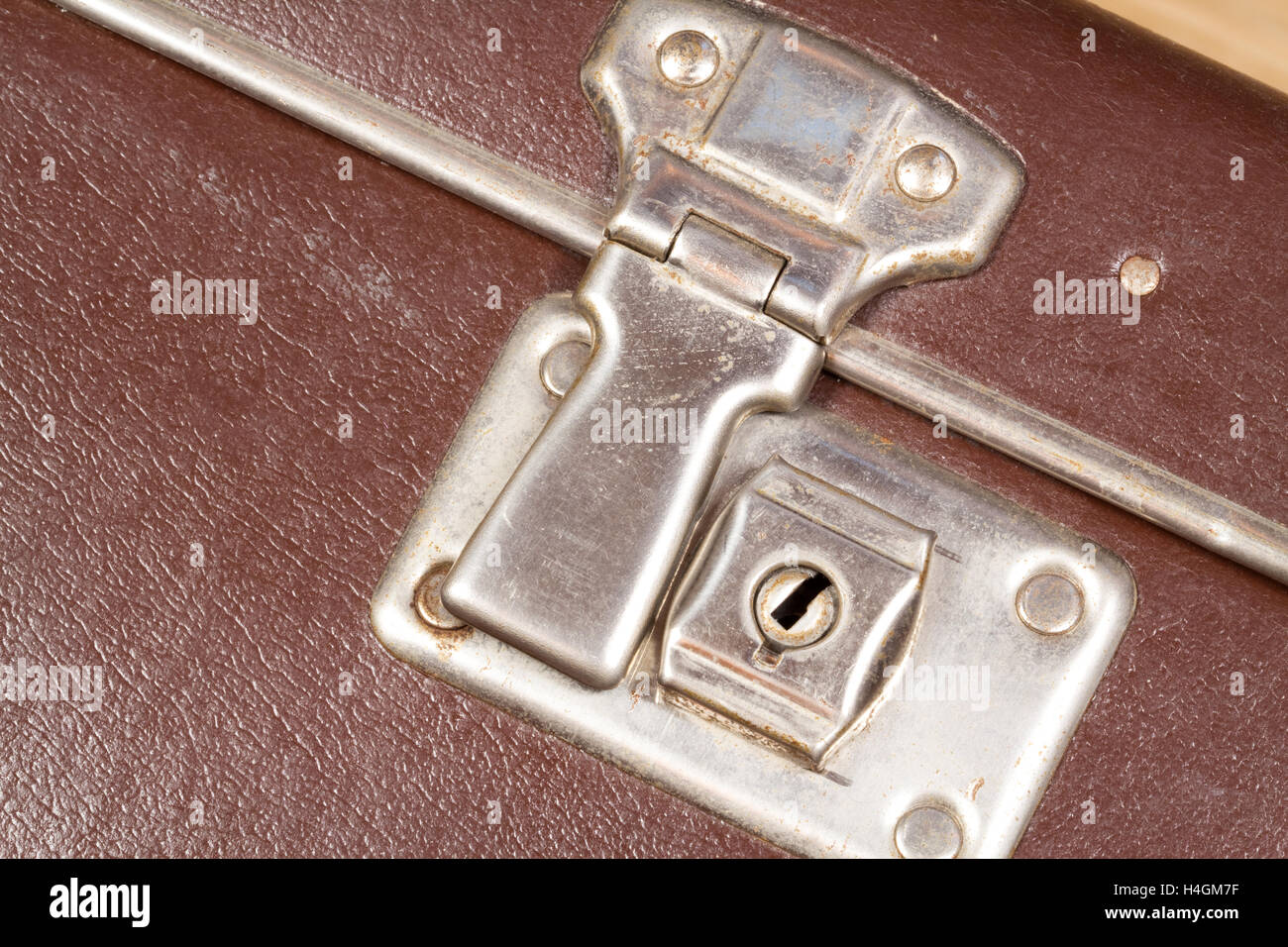 Close up of a clasp and lock of an old fashioned suitcase Stock Photo