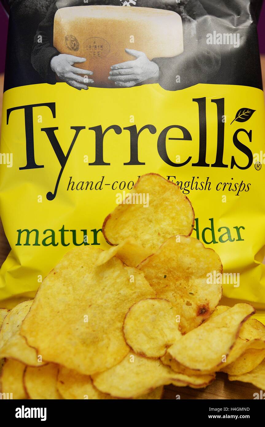 A packet of Tyrrell's crisps, as Tyrell's, the English maker of hand-cooked crisps, is to create hundreds of new jobs following its takeover by US food firm Amplify Snack Brands, shrugging off Brexit fears in the process. Stock Photo