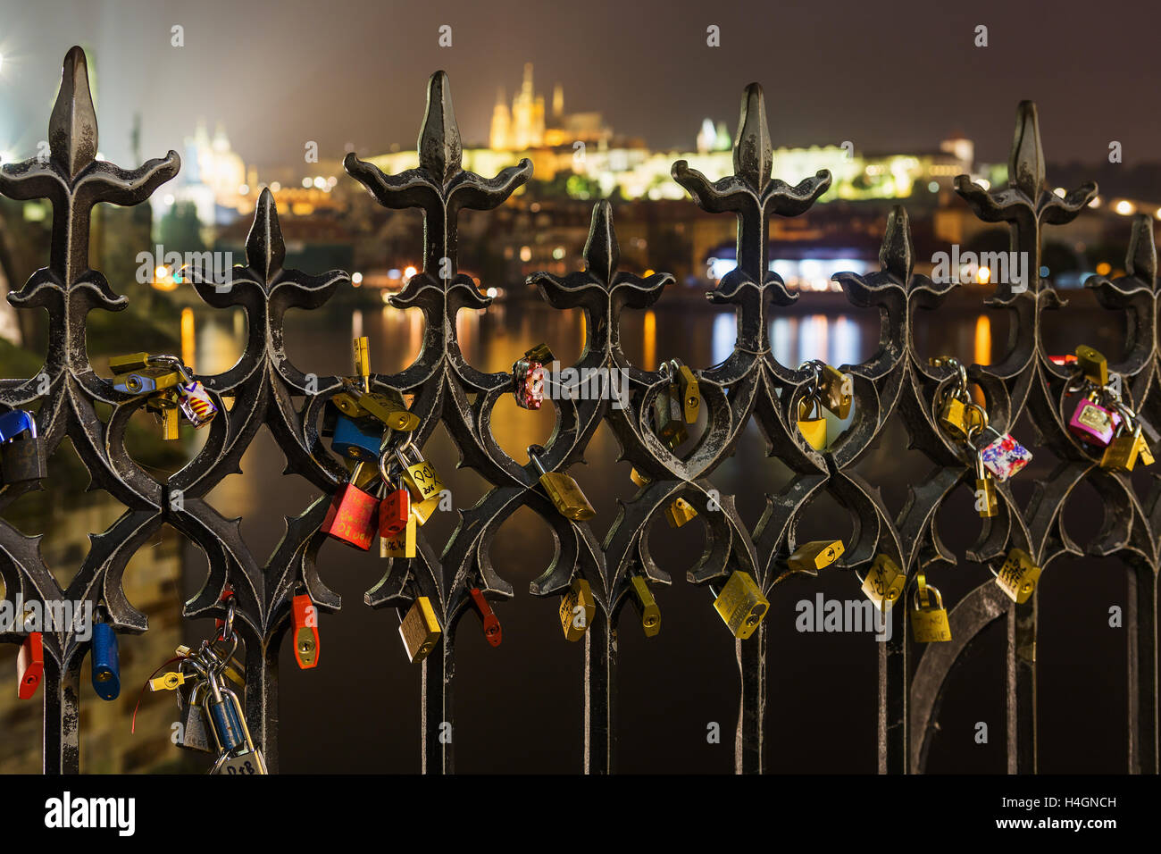 Many Love locks on the fence, heart padlock on the Charles Bridge in