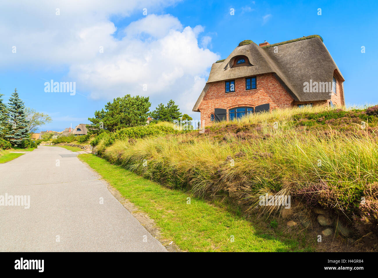 Road In Westerheide Village With Typical House On Side Sylt