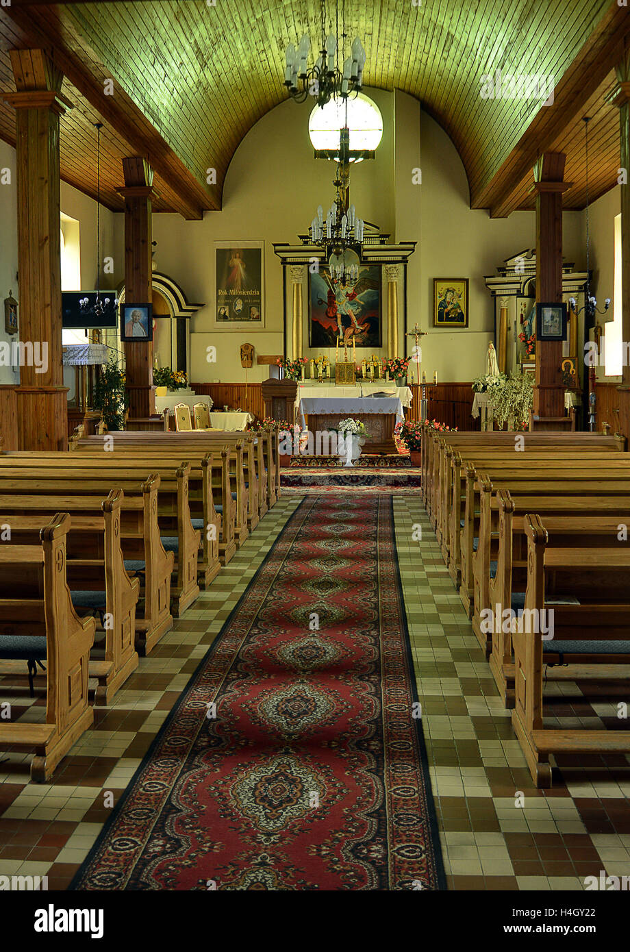 A view down the aisle to the altar of the Polish parish church in Zytkiejmy, built between 1579 and 1589 Stock Photo