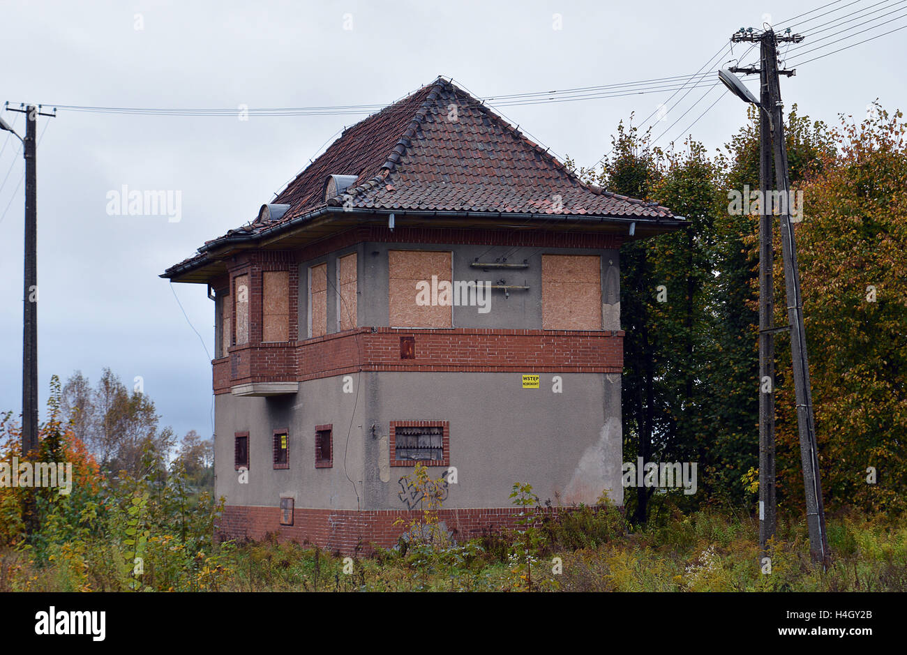 Gołdap, Poland - 7 October 2016: An abandoned railway signal box stands on the outskirts of Goldap. Stock Photo