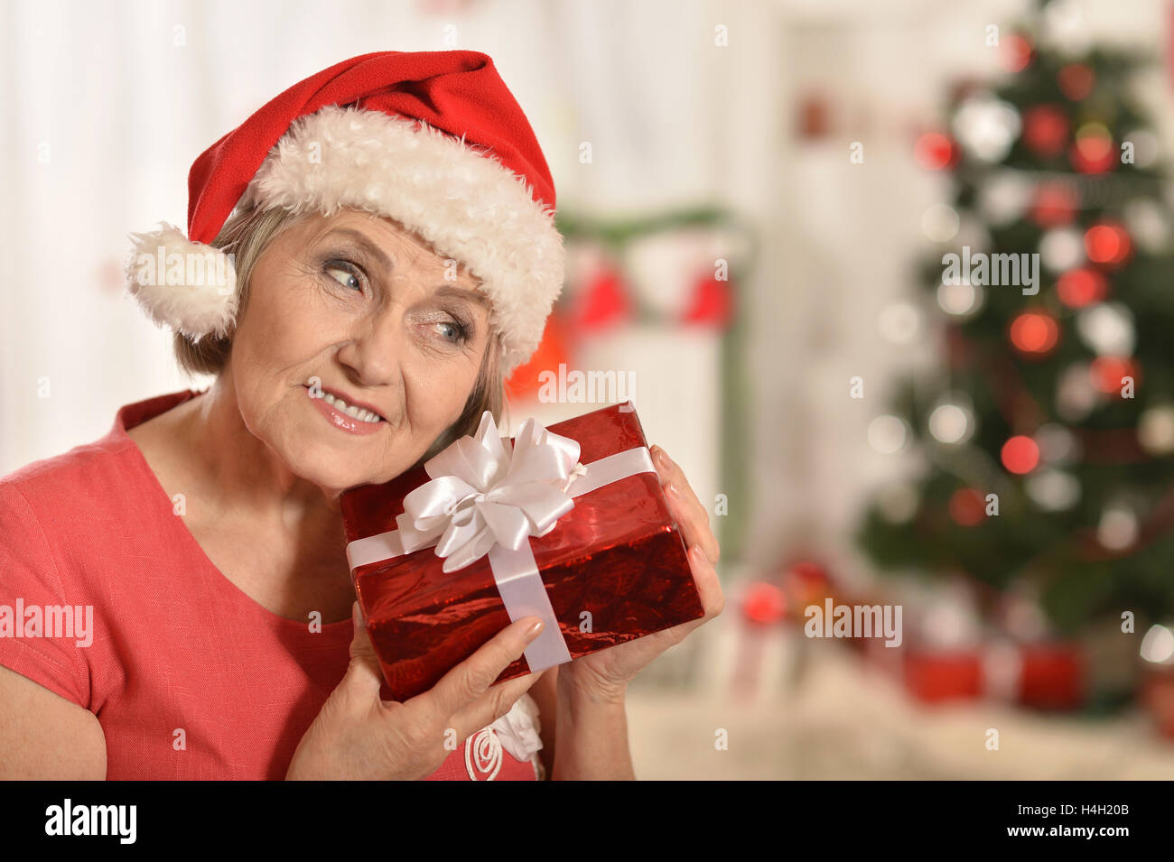 Senior woman with   gifts Stock Photo