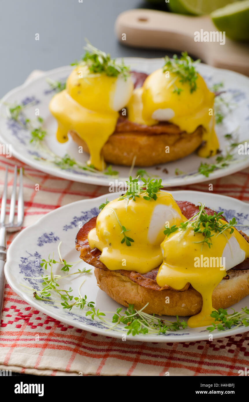 Eggs benedict, prosciutto topped with Hollandaise sauce Stock Photo Alamy