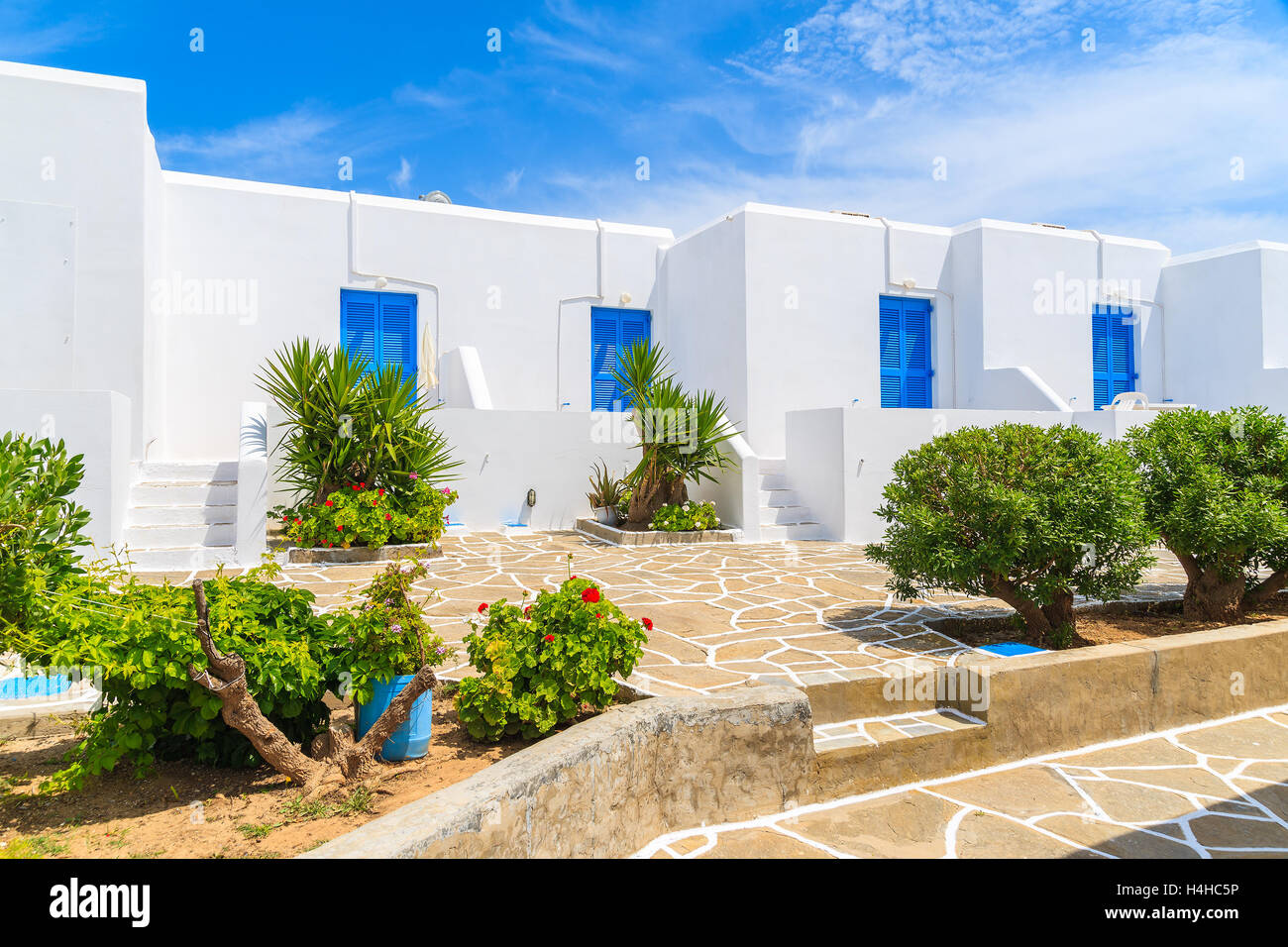 Typical street with Greek style white houses in Santa Maria village, Paros island, Greece Stock Photo