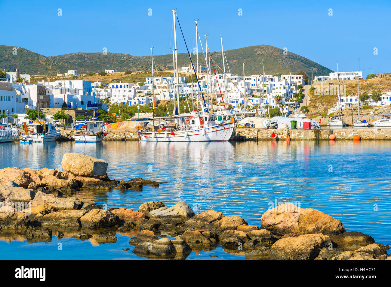 A view of Naoussa fishing port at sunset time, Paros island, Cyclades, Greece Stock Photo