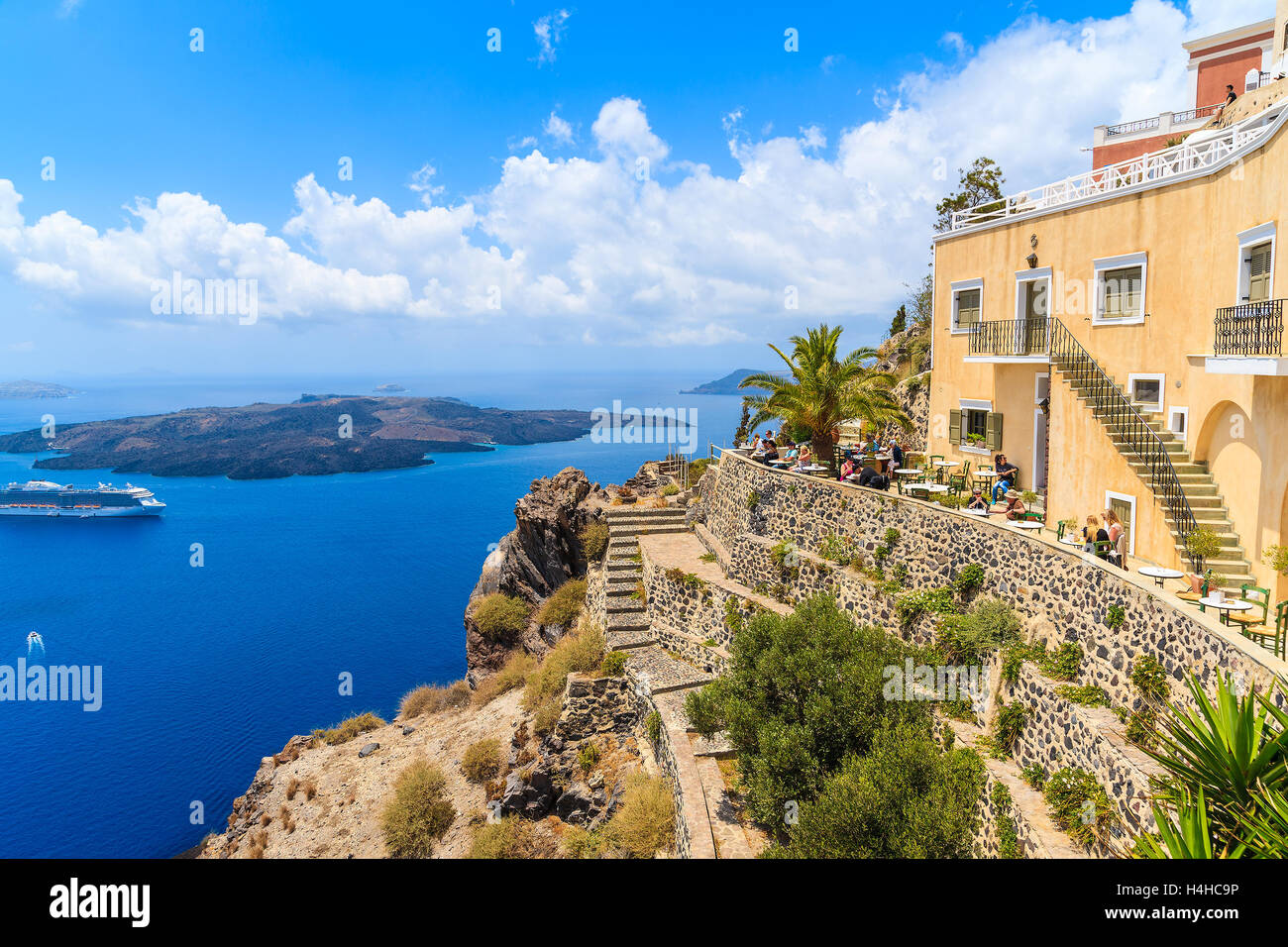 Restaurant building on caldera cliff in Firostefani village, Cyclades, Santorini island, Greece Stock Photo
