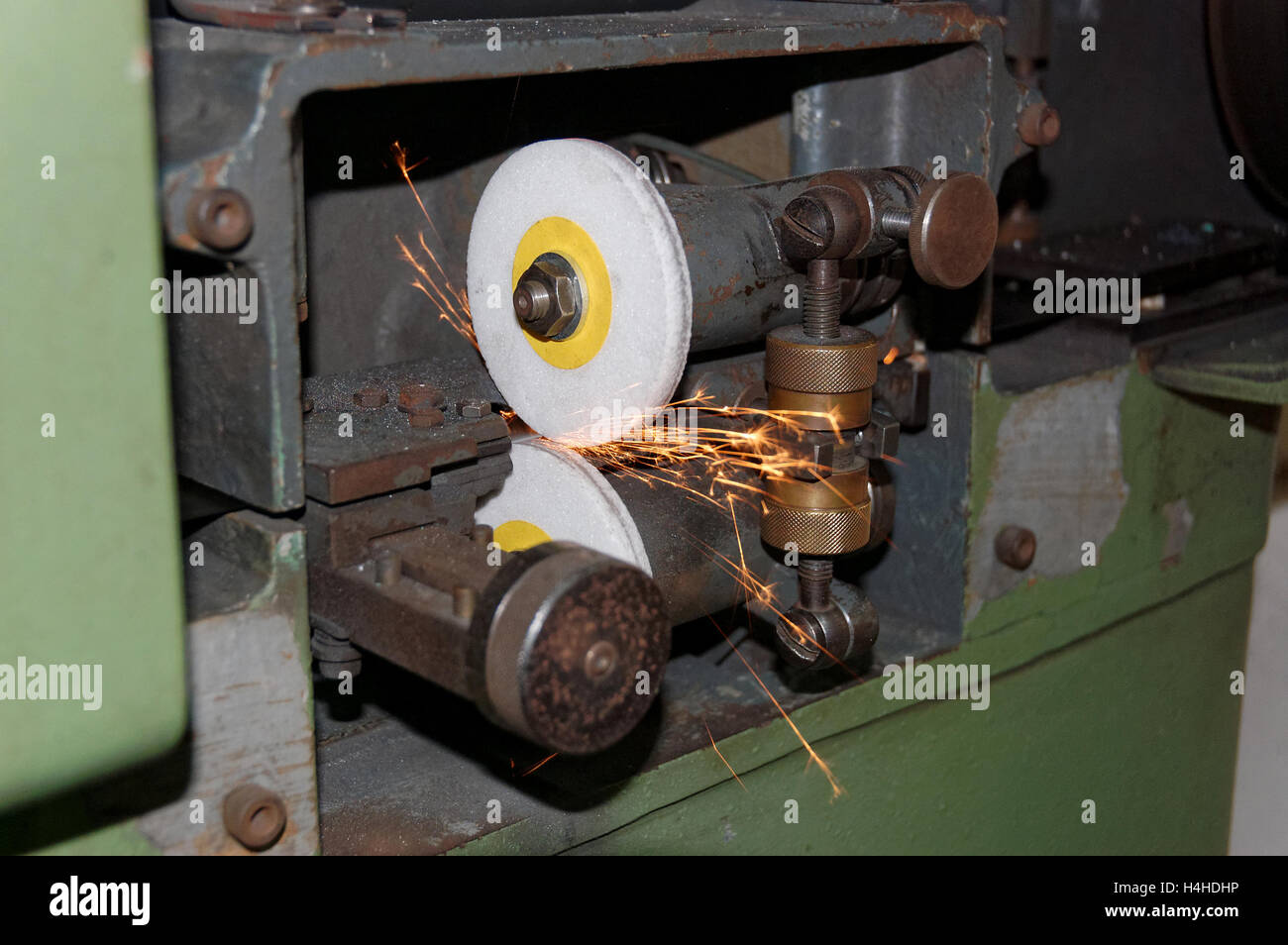 Mechanical stone for sharpening knives of split machines for leather Stock Photo Alamy