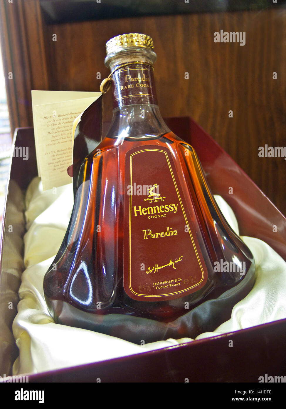 Rare expensive Hennessy 'Paradis' Cognac bottle on display. A blend of over one hundred very old 'eaux-de-vie' from Cognac's finest growing regions. Stock Photo