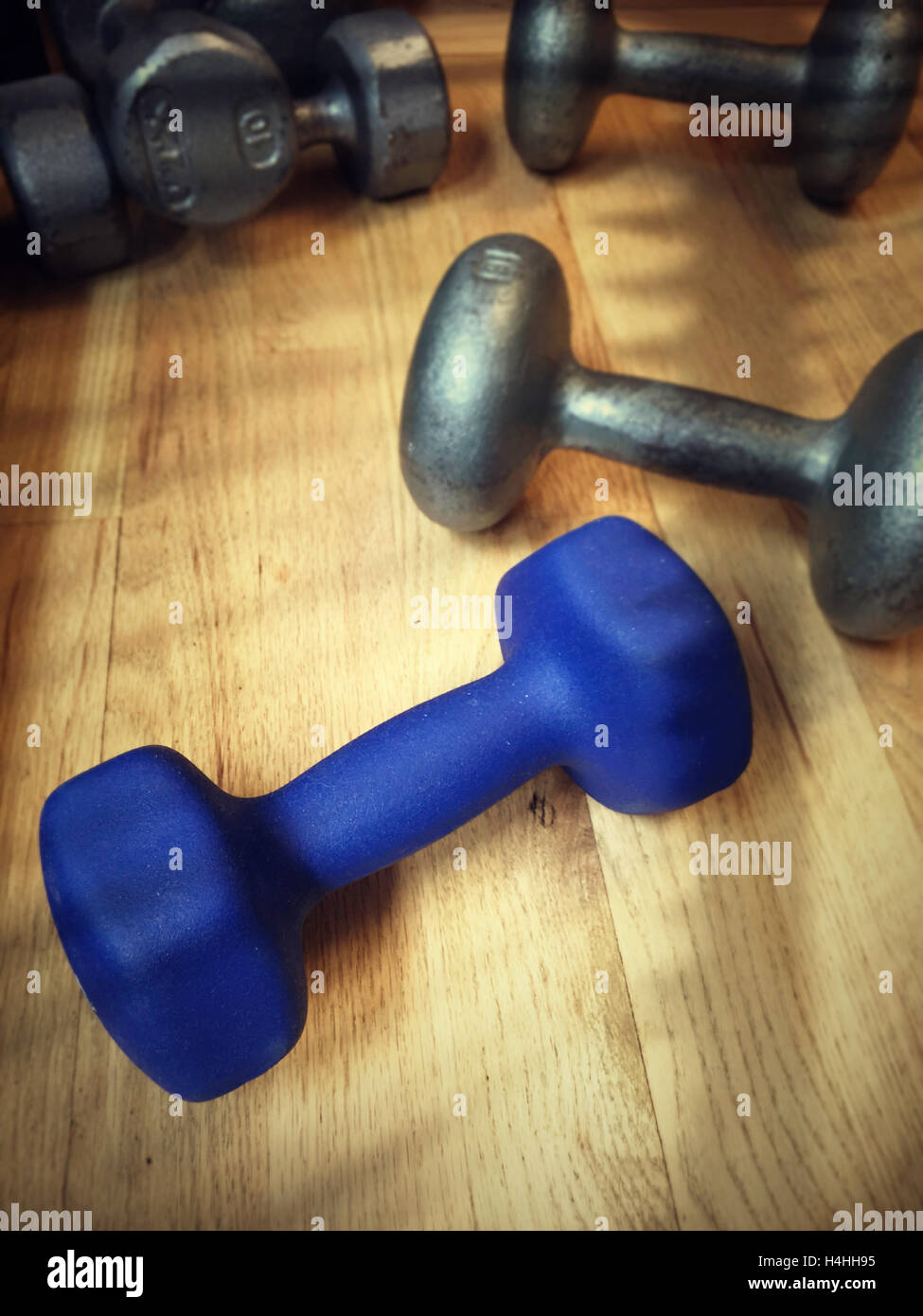 Still Life , Small Weights  on Gym Floor, USA Stock Photo