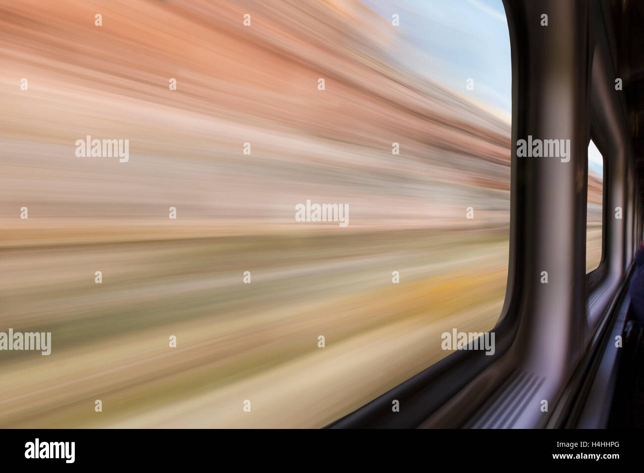 blurred abstract of canyon landscape seen from a  train window in motion - travel concept Stock Photo