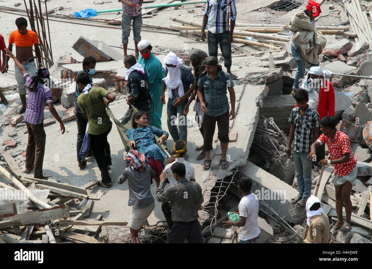 Bangladeshi People Gather As Rescuers Look For Survivors And Victims At The Site Of Rana Plaza 