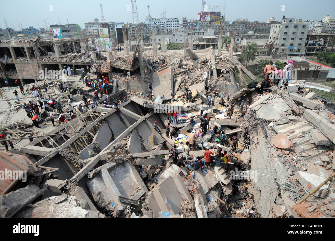 Savar Building Bangladeshi people gather as rescuers look for survivors and victims at ...
