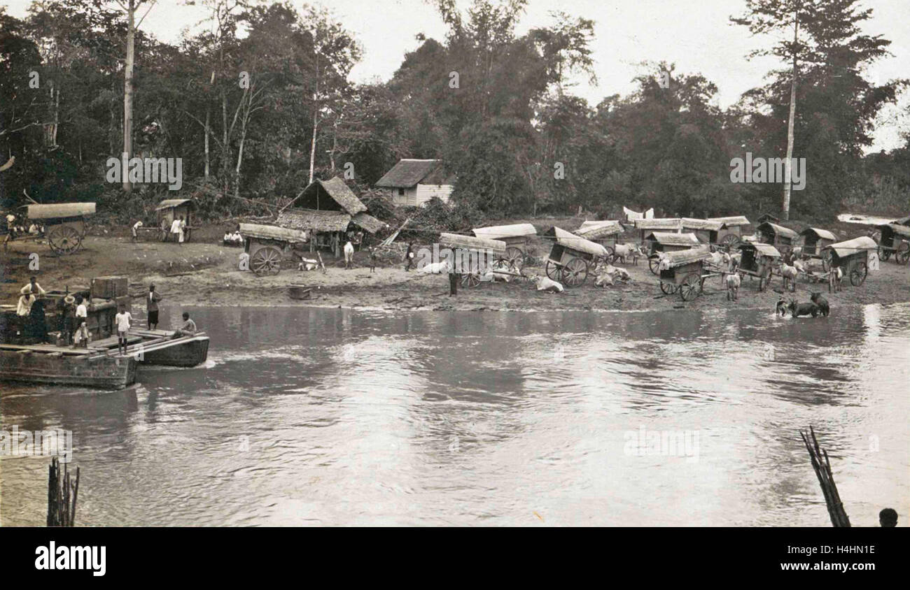 Sumatra indonesia ferry across river with bullock carts ashore, Anonymous, 1900 - 1920 Stock Photo