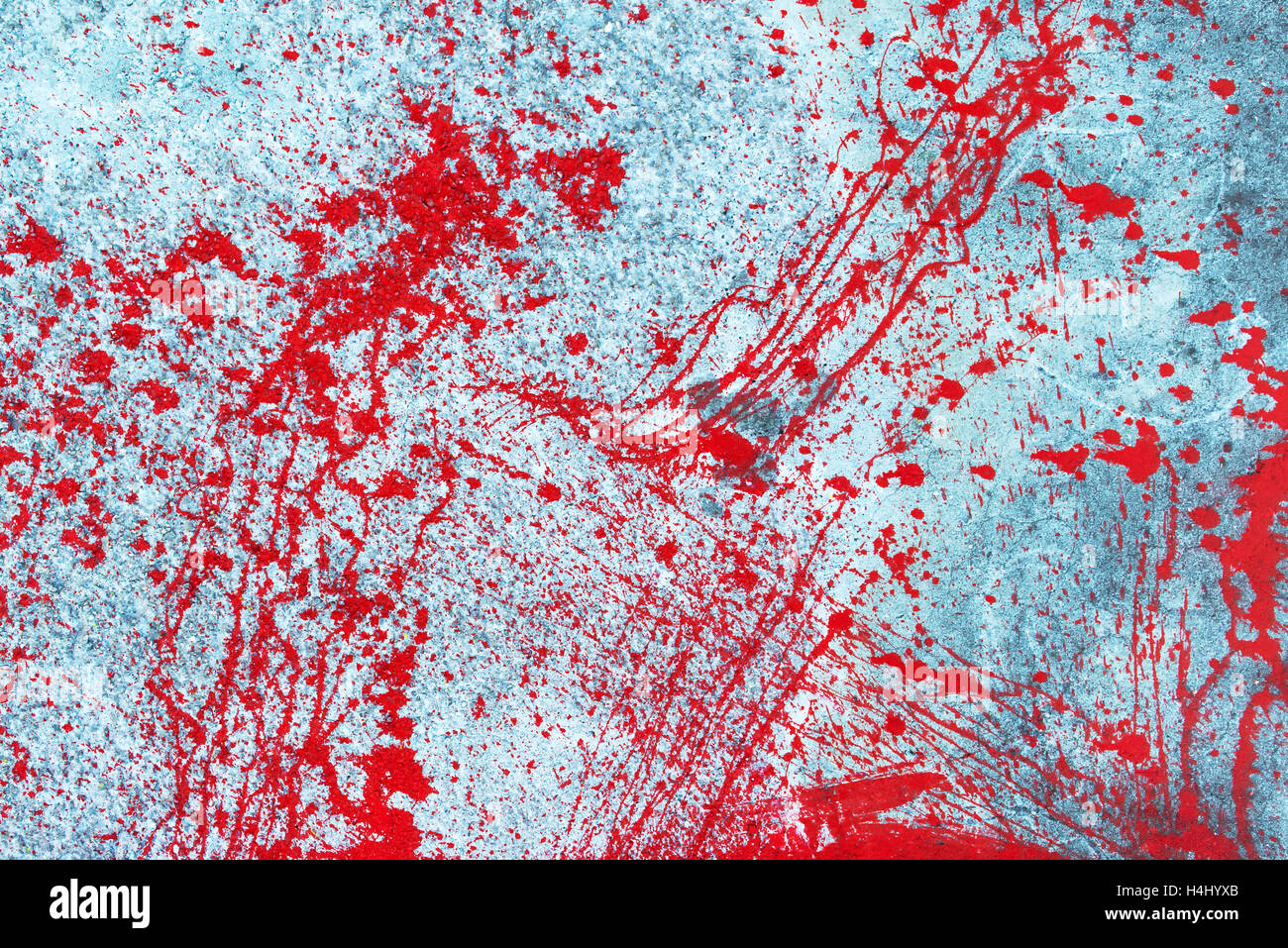 Red blood paint splatter, splash and spray on exterior wall, urban background Stock Photo