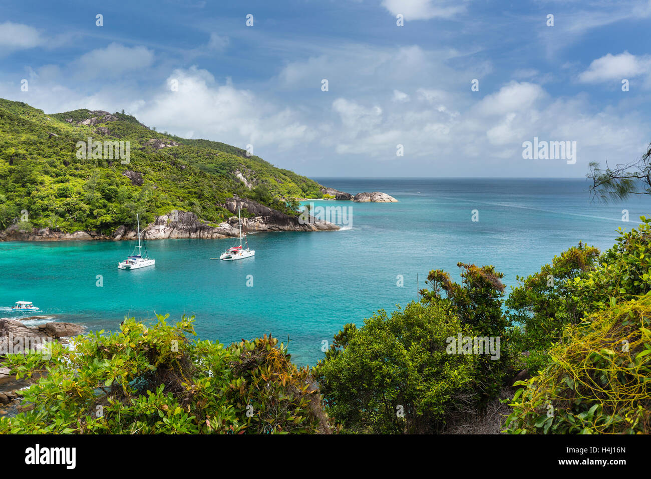 Boats at Anse Major in the west of Mahe, Seychelles Stock Photo