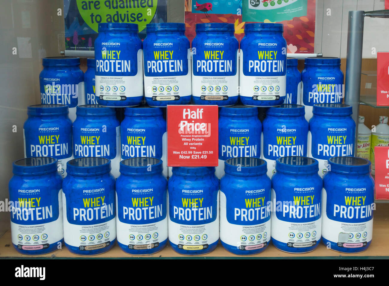 Display of whey protein muscle building products in a Holland and Barrett  health food shop Stock Photo - Alamy