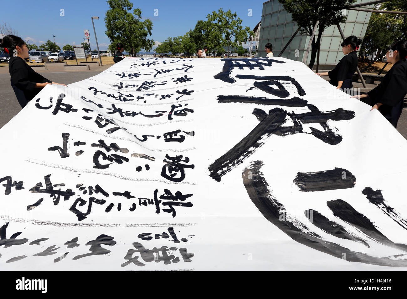 Japanese schoolgirls competes for the written technology in a Kagawa Calligraphy Festival 2016. Stock Photo