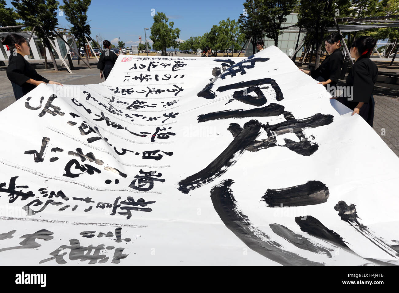 Japanese schoolgirls competes for the written technology in a Kagawa Calligraphy Festival 2016. Stock Photo