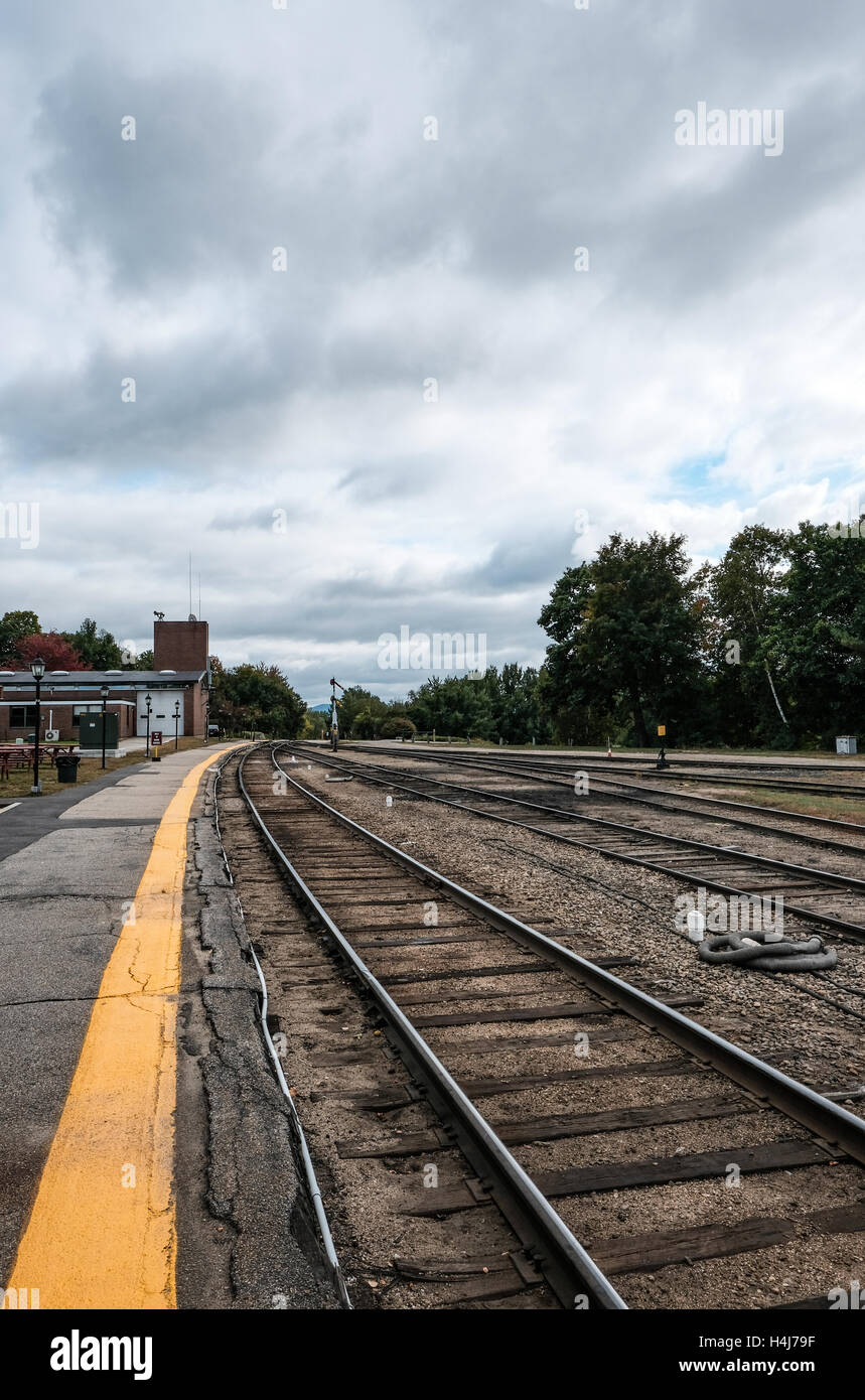 Old railroad tracks seen from an old train station in the town of North