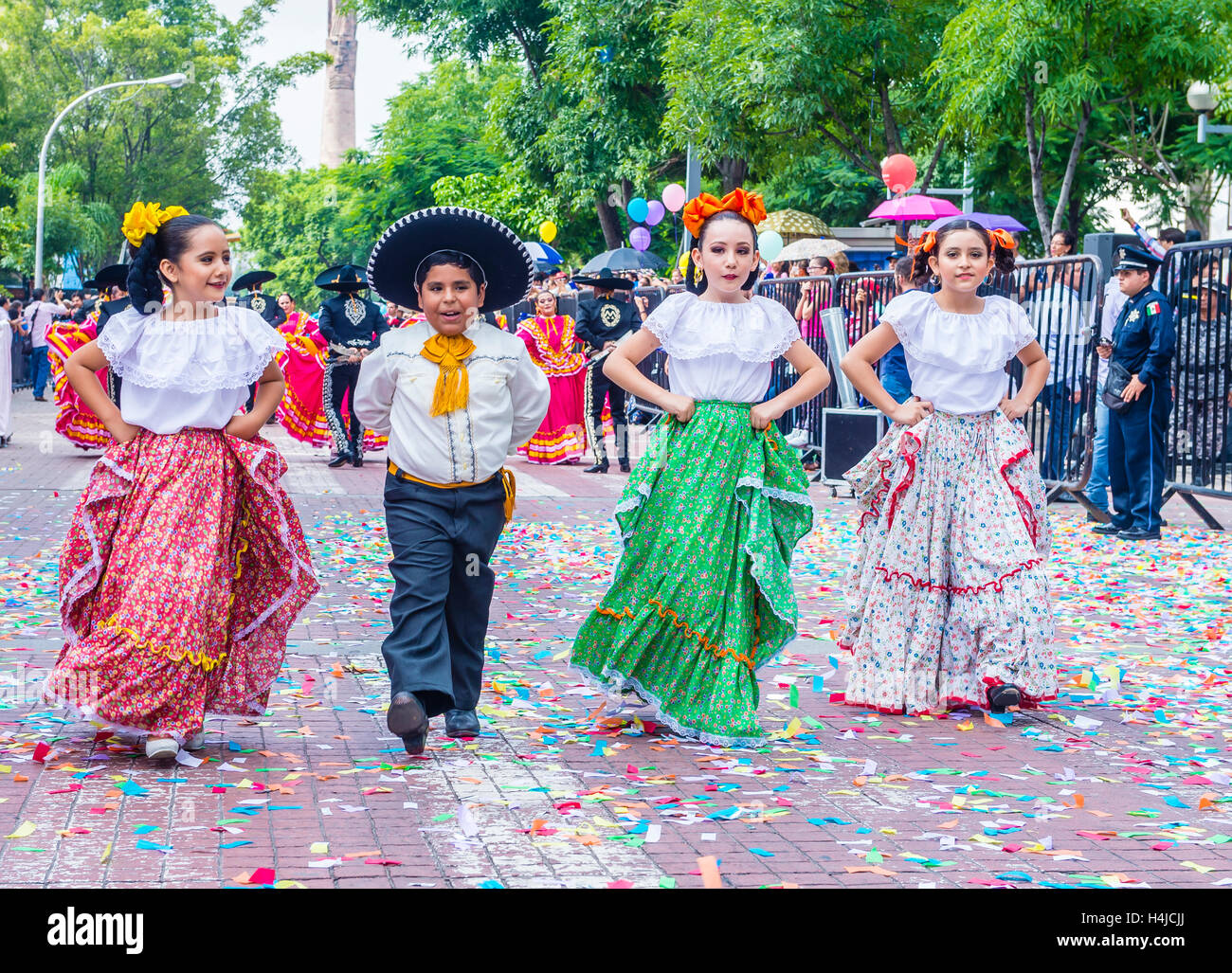 Participants in a parade during the 23rd International Mariachi ...