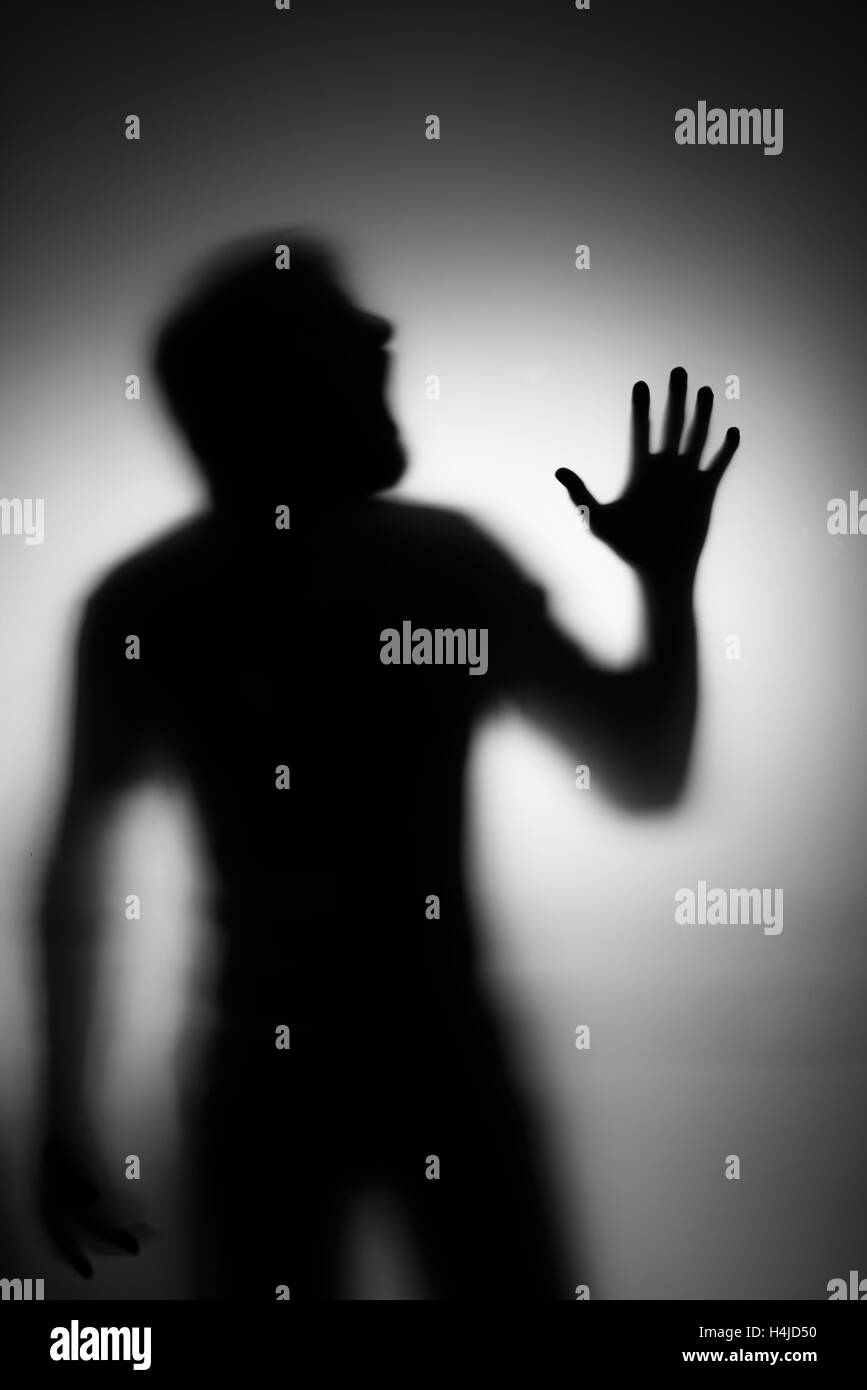 Screaming mans silhouette Stock Photo