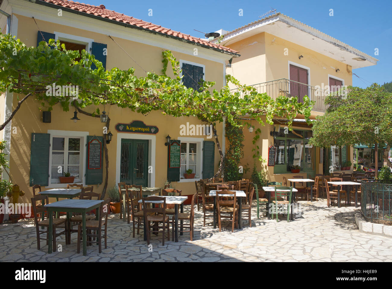 Restaurants central square Lakka town Paxos Ionian Islands Greece Stock Photo