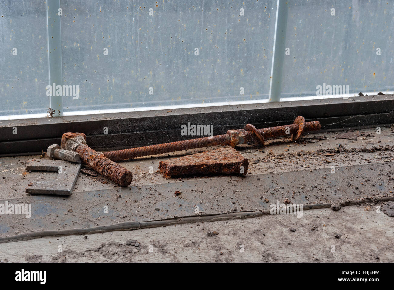 Rusty objects on dirty window sill Stock Photo