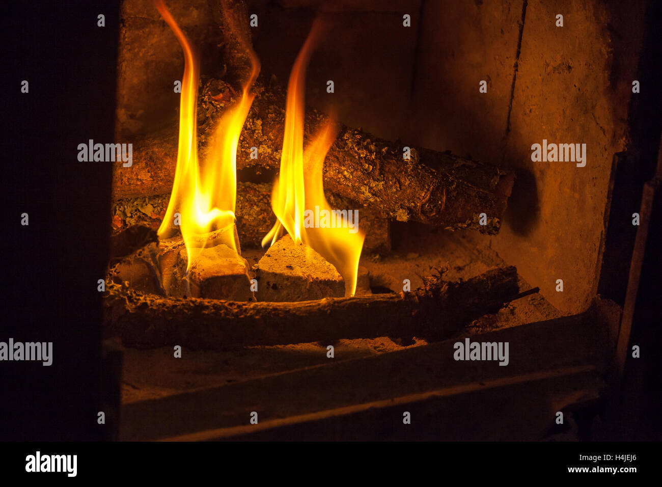 Lighting a wood burner Stock Photo Alamy