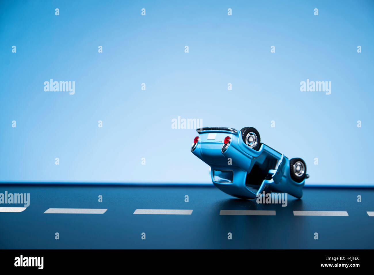 Classic fifties scale model toy cars accident on the road Stock Photo