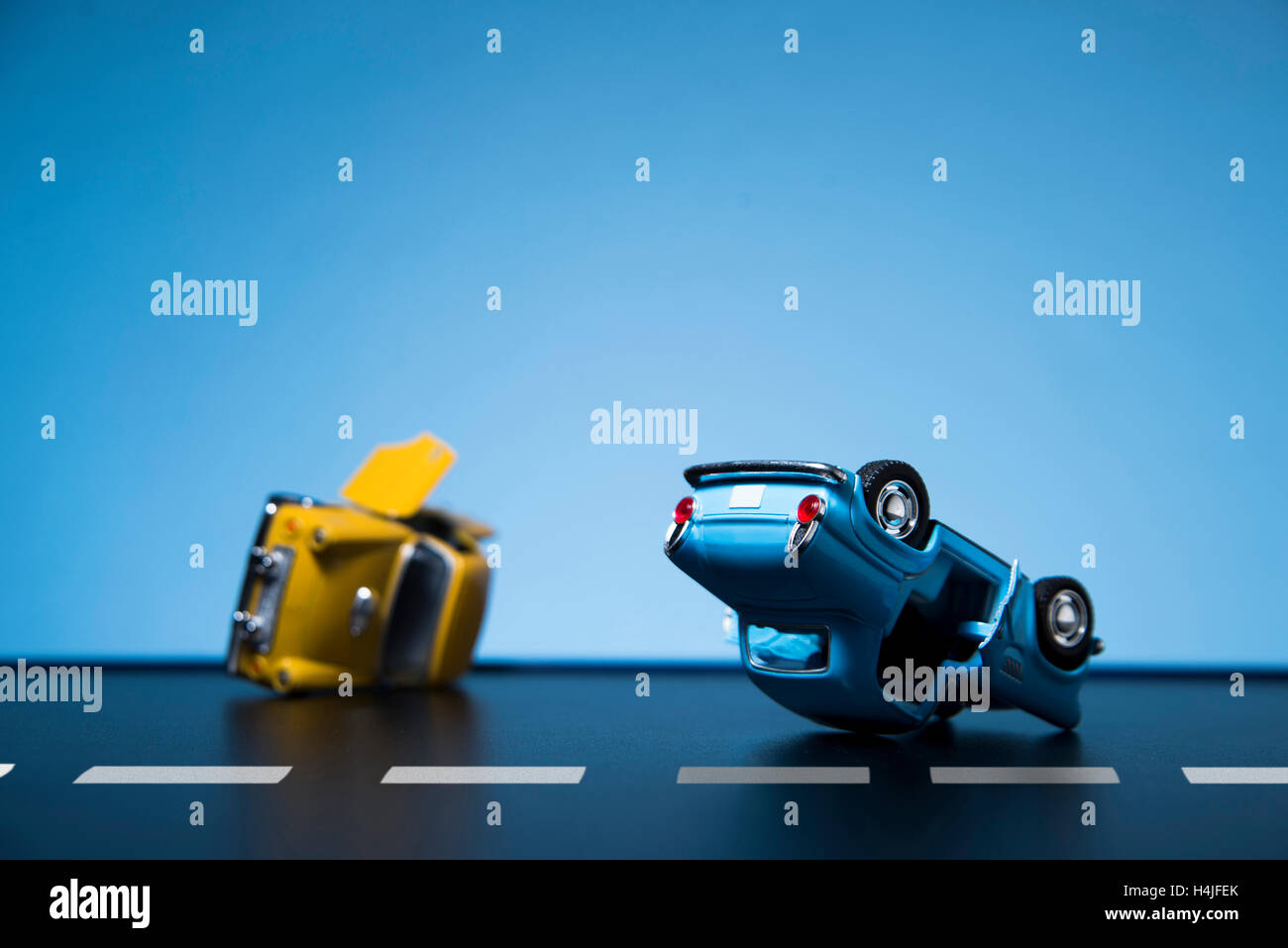 Classic fifties scale model toy cars accident on the road Stock Photo