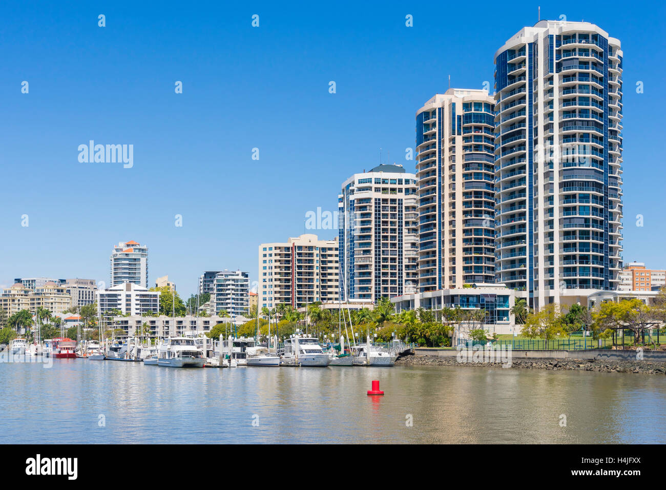 Waterfront apartments and marina in Brisbane Stock Photo