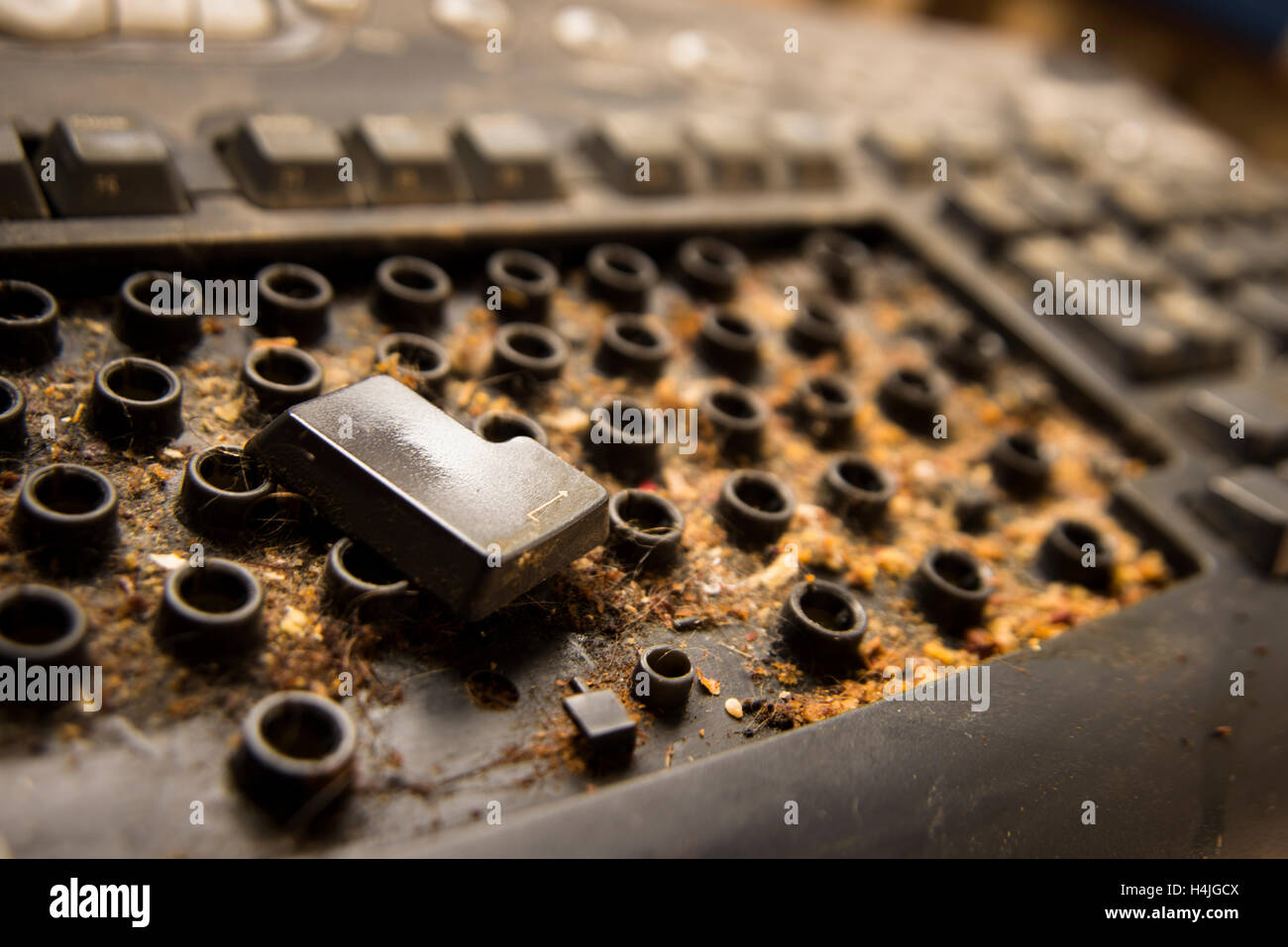 Dirty computer keyboard. Dirt amassed about 10 years. Enter key is alon on the eyboard. Stock Photo