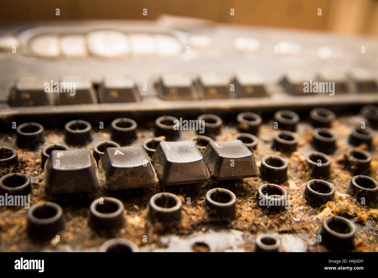 Dirty computer keyboard. Dirt amassed about 10 years. Written Fail with keys. Stock Photo