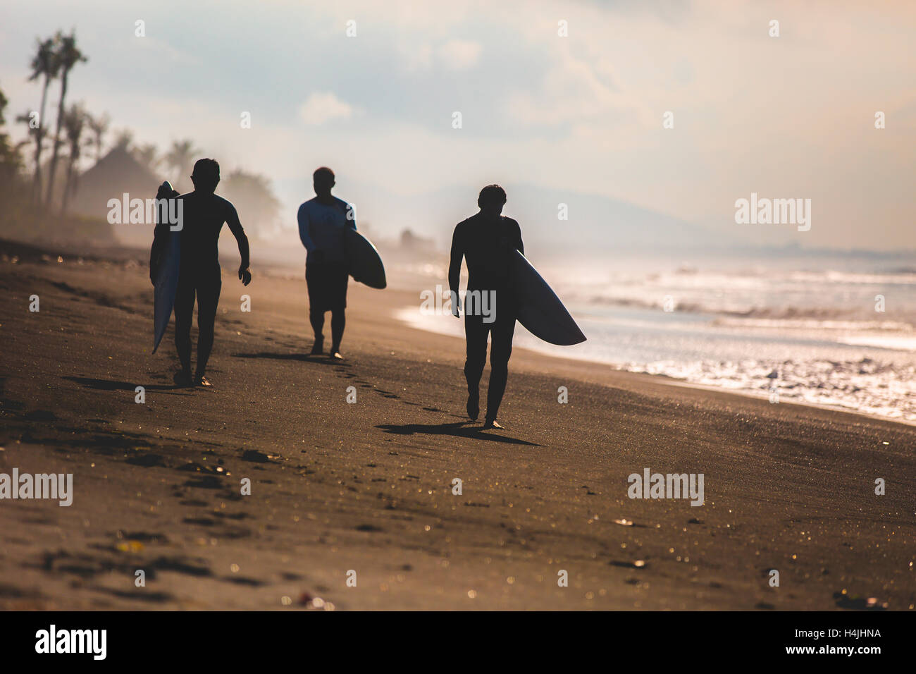 Girl on longboard surfing bali hires stock photography and images Alamy