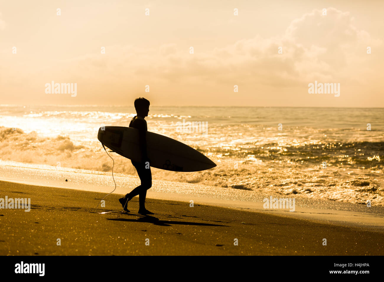 Girl on longboard surfing bali hires stock photography and images Alamy