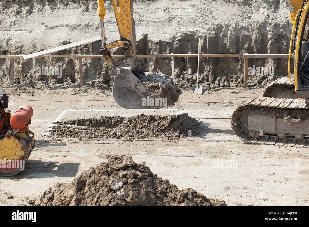 Excavator Digger On A Building Site. Earthwork Stock Photo - Alamy