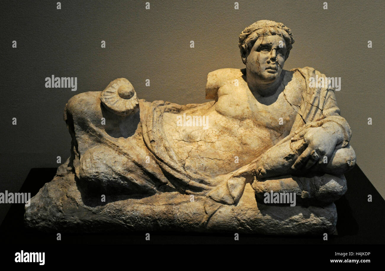 Lid of a cinerary urn with a male figure reclining on cushions and holding a drinking bowl. Alabaster. Around 200 BC. Remains of polychromy. Museum of Mediterranean and Near Eastern Antiquities. Stockholm. Sweden. Stock Photo