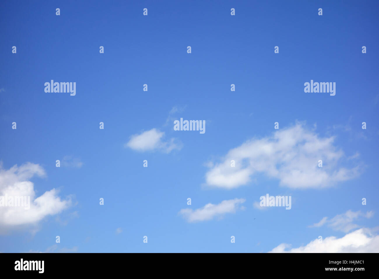 white clouds floating on a background of blue sky Stock Photo - Alamy