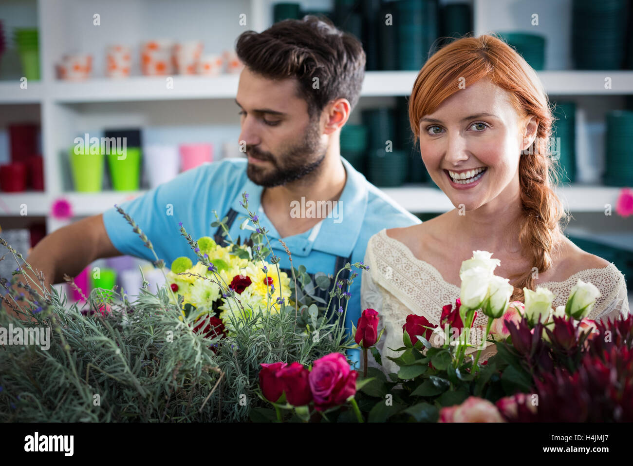 Couple with flowers hi-res stock photography and images - Alamy