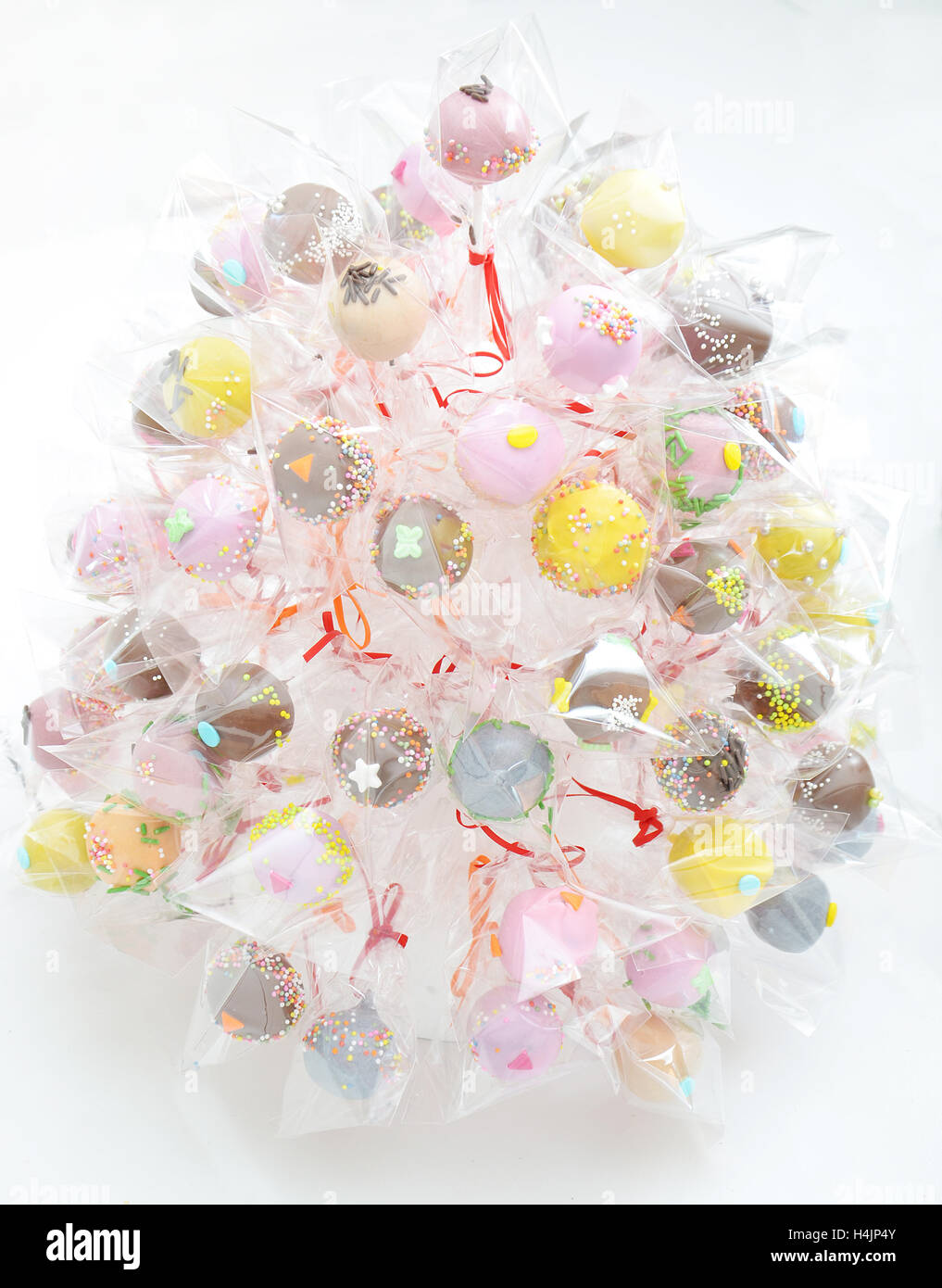 a bunch of cake pop decorate decorate with a cone, like a christmas tree Stock Photo