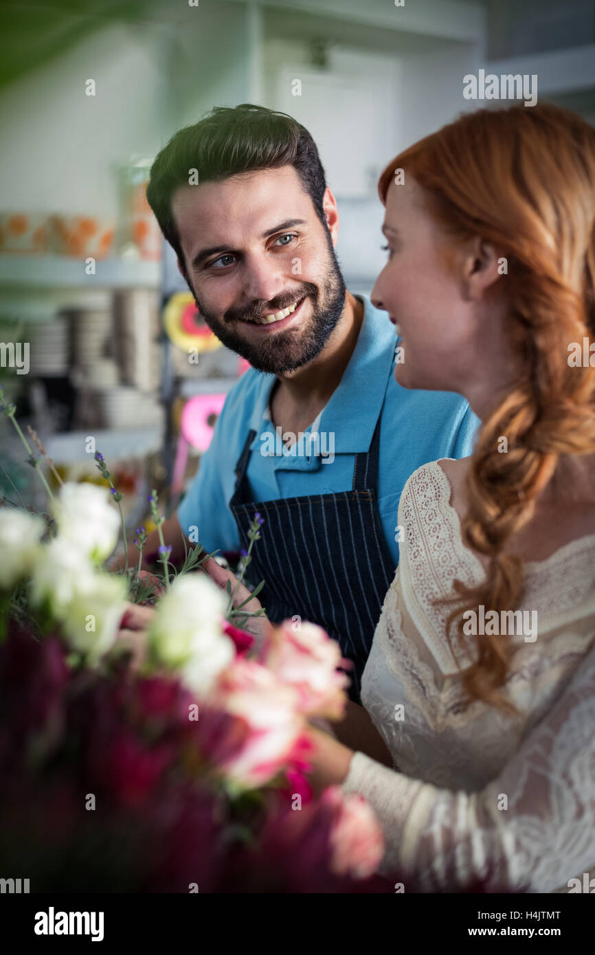 Couple with flowers hi-res stock photography and images - Alamy