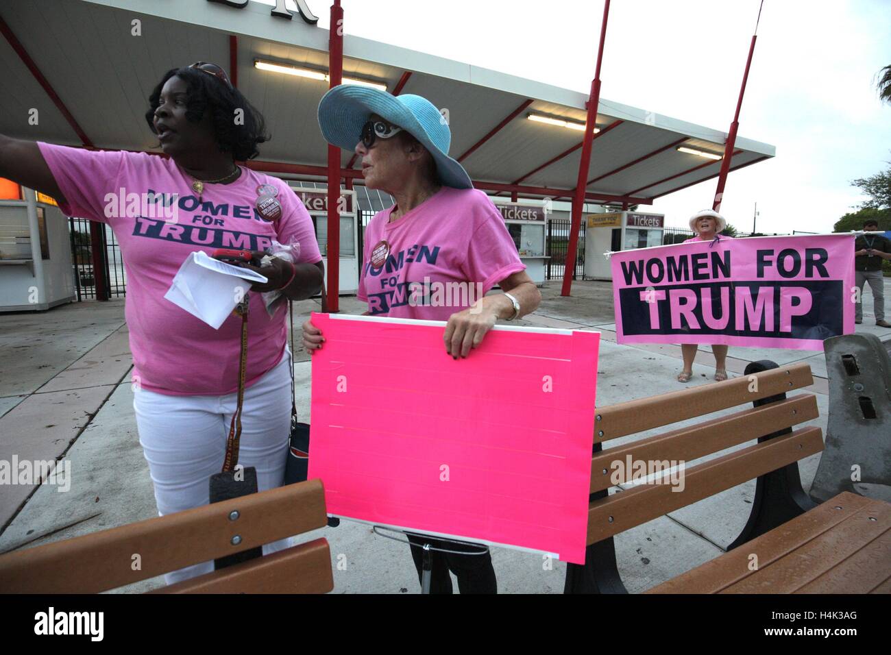 October 13, 2016 - Unincorporated Palm Beach County, Florida, U.S. - L to R: Sara Bernard, Boca Raton, Diane Kushner, Boynton Beach and Linda Polsney, Pompano Beach wait for the Donald Trump rally at the South Florida Fairgrounds on Thursday, October 13, 2016. Women for Trump started eight months ago and hold a weekly rally in Broward County, Fla. at Oakland Boulevard and Federal Highway, said Kushner. (Credit Image: © Thomas Cordy/The Palm Beach Post via ZUMA Wire) Stock Photo