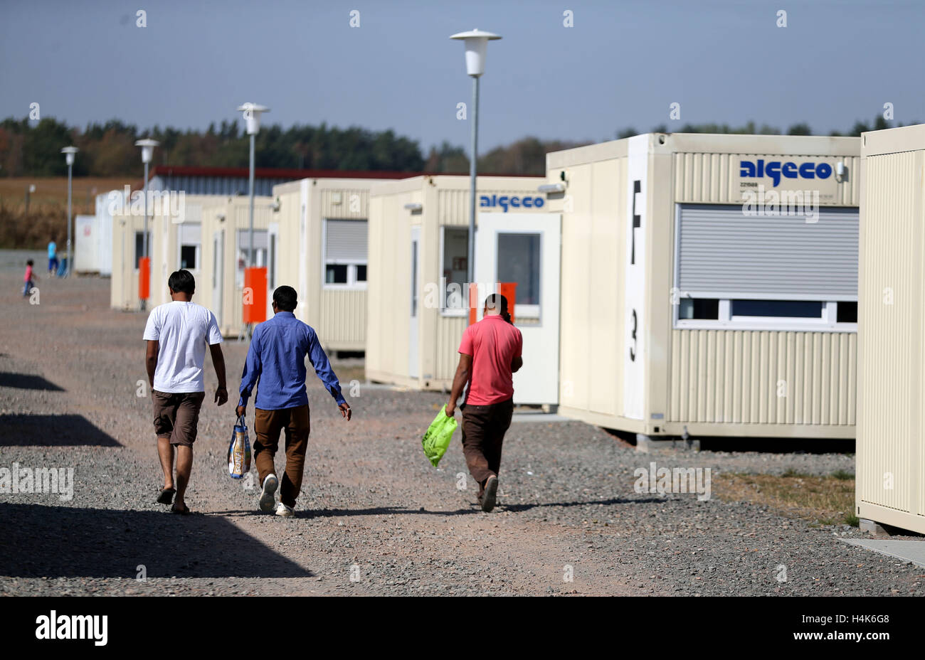 Halberstadt, Germany. 8th Sep, 2016. ARCHIVE - Refugees walks through the central admitting facility for asylum seekers in Halberstadt, Germany, 8 September 2016. Photo: Jan Woitas/dpa/Alamy Live News Stock Photo