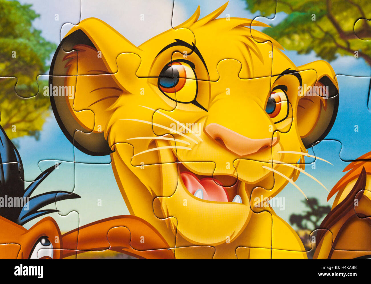 Disney store the Lion King jigsaw puzzle pieces detail Stock Photo