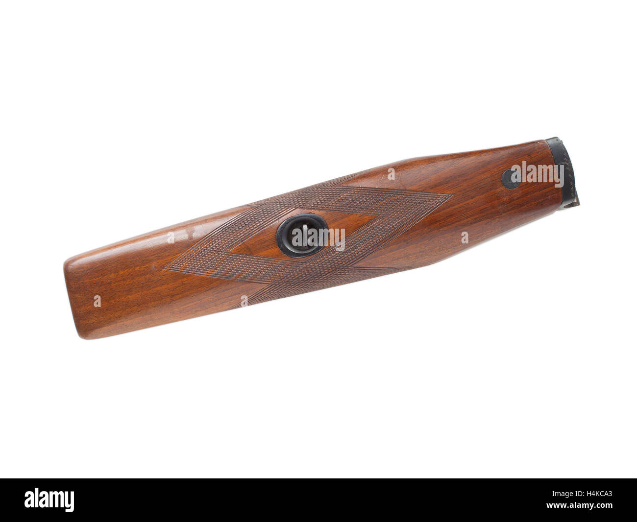 Front end of an old shotgun that has checkering isolated on white Stock