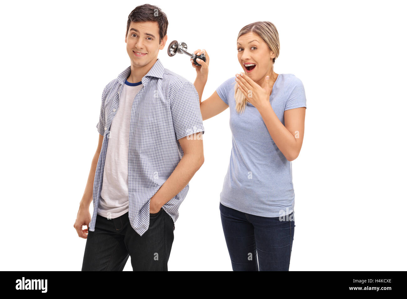 Cheerful young woman honking horn Cut Out Stock Images & Pictures Alamy