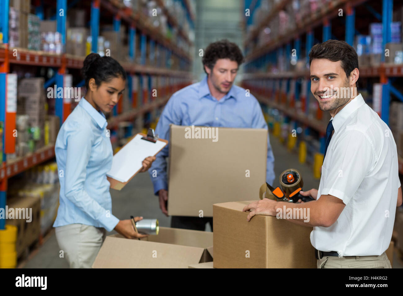 Warehouse workers preparing a shipment Stock Photo Alamy