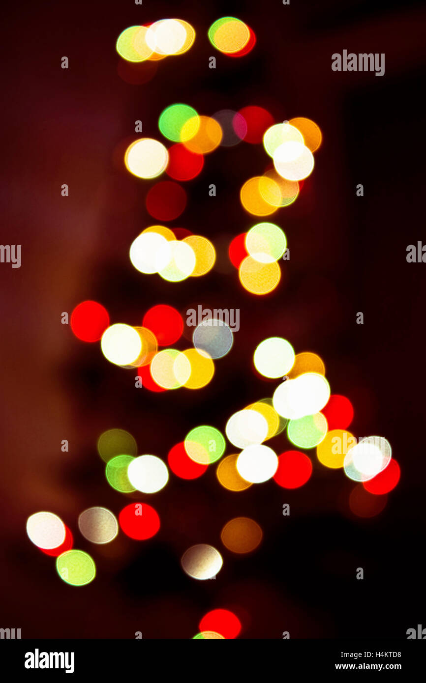 Blur/defocus colorful lights of a christmas tree lamps. Stock Photo