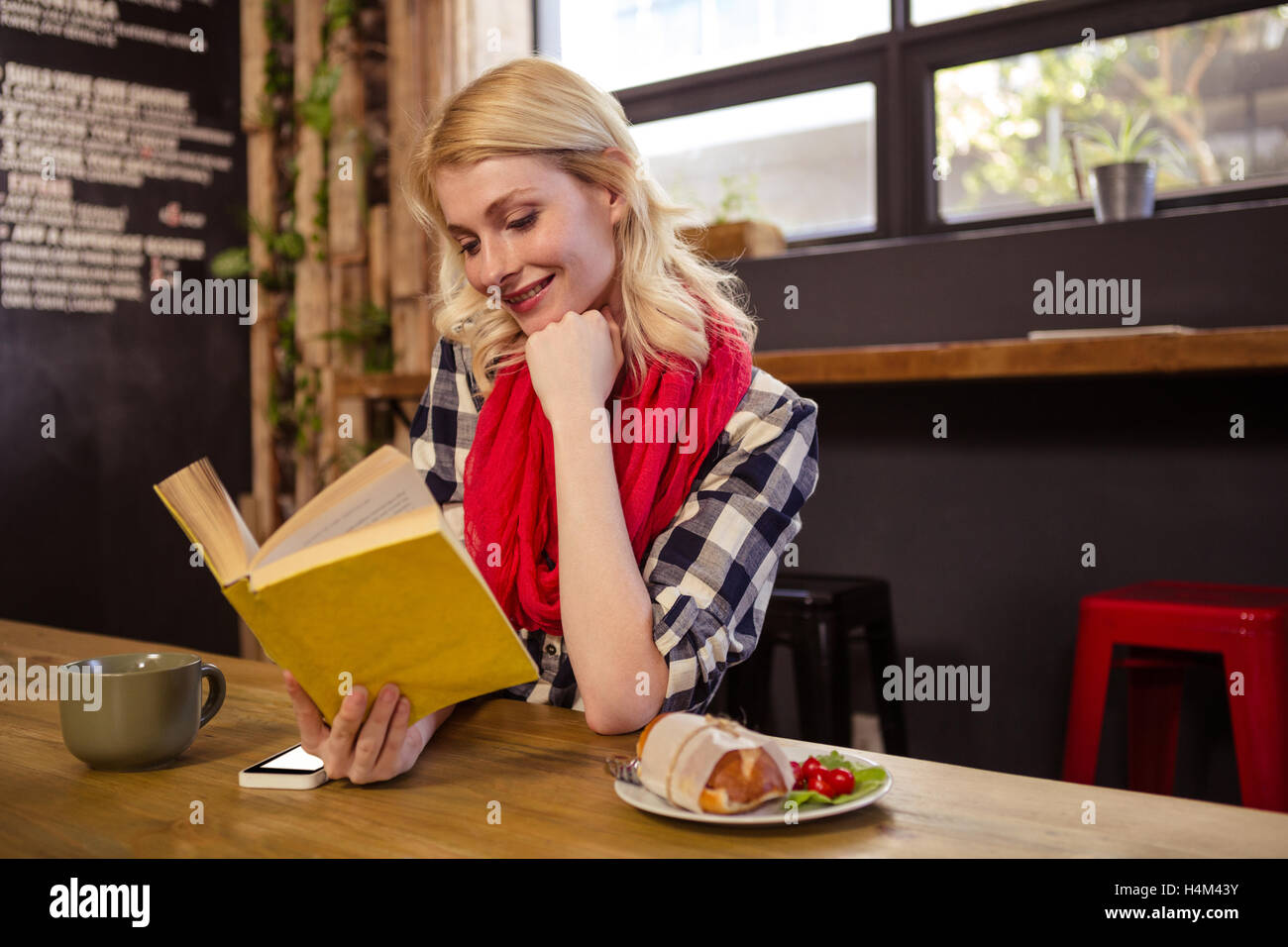 Beautiful woman reading book Stock Photo